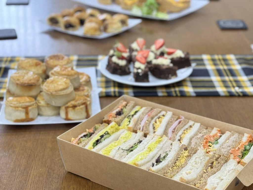 Sandwiches, chicken curry pies, homemade cakes