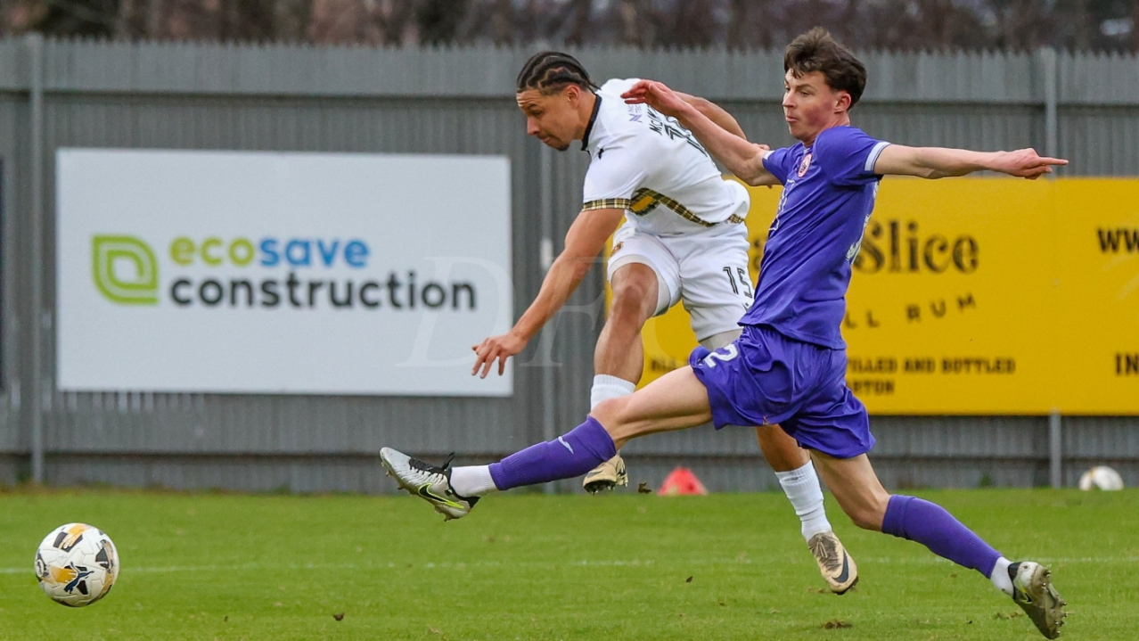 Leighton McIntosh shoots for goal as Dumbarton face Stirling Albion