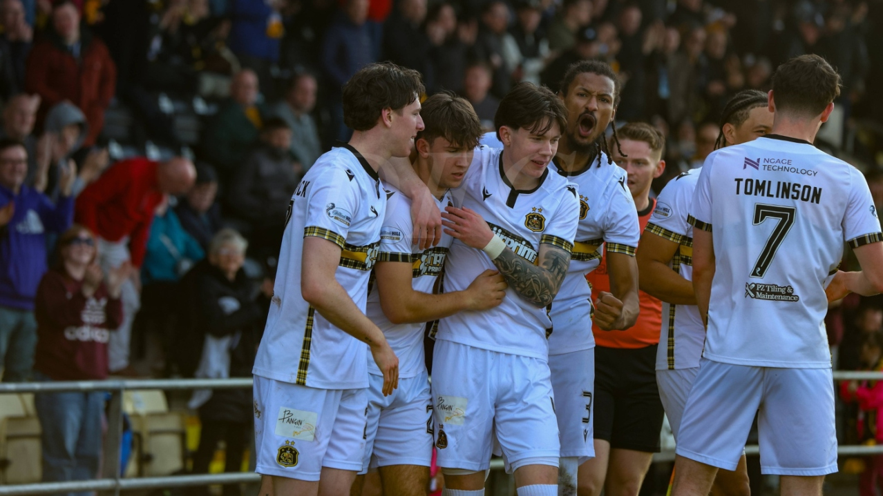 Dumbarton players celebrate scoring against Annan Athletic in March 2026