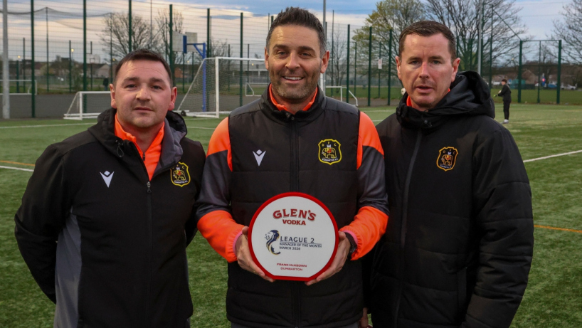 Frank McKeown of Dumbarton FC with the Glens League Two Manager of the Month award, and assistants Mark Docherty and Stephen Simmons